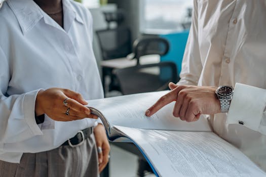 image of a contractor reviewing bid documents