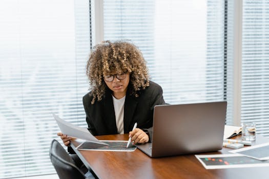 image of a contractor analyzing competitor data